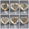Faceted heart crystal arc ring