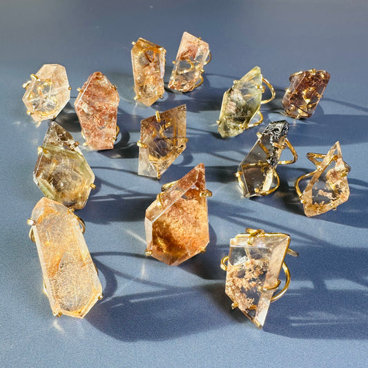 Freeform faceted quartz ring with natural inclusions