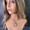 Oversized freeform faceted rose quartz pendant