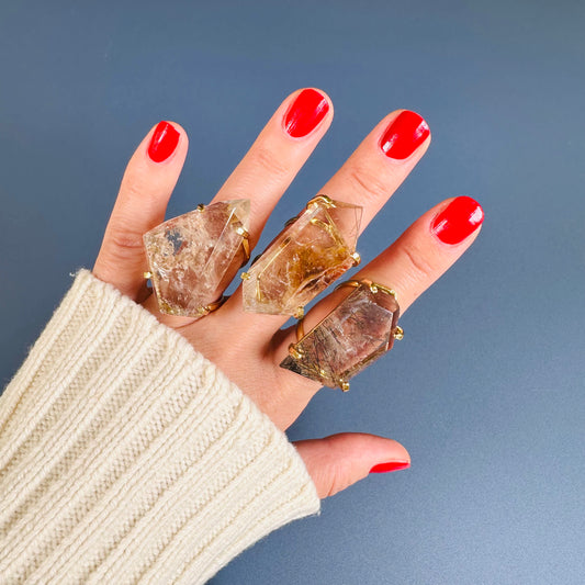 Freeform faceted quartz ring with natural inclusions