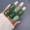 Green quartz oval cabochon ring