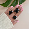 Freeform faceted black onyx ring