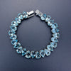 925 sterling silver blue topaz pear-shaped tennis bracelet