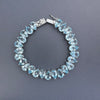 925 sterling silver blue topaz pear-shaped tennis bracelet