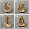 Faceted pear-shaped smoky crystal ring