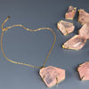 Oversized freeform faceted rose quartz pendant