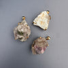 Raw tourmaline in matrix pendant