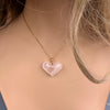 Rose quartz puffy heart pendant