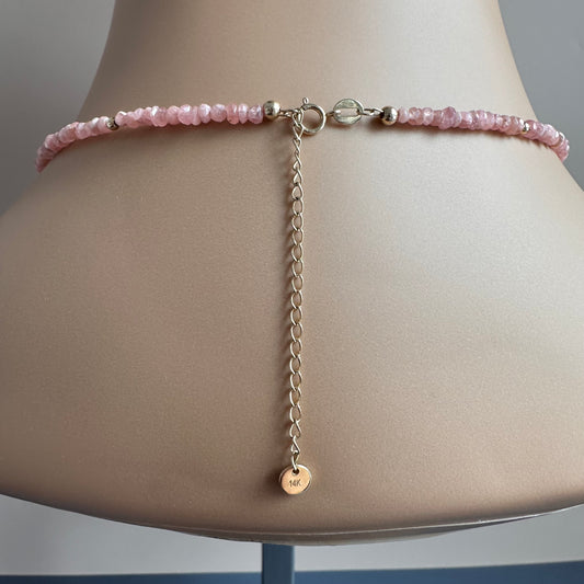 14-karat gold rhodochrosite hamsa hand necklace