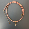 14-karat gold rhodochrosite hamsa hand necklace