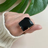 Freeform faceted black onyx ring
