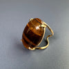Tiger's eye oval cabochon ring