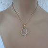 Freeform faceted crystal pendant