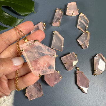 Oversized freeform faceted rose quartz pendant