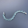 925 sterling silver blue topaz pear-shaped tennis bracelet