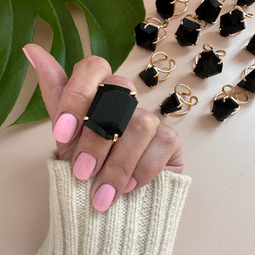 Freeform faceted black onyx ring