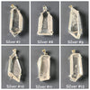 Freeform faceted lemurian crystal pendant