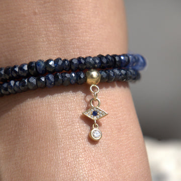 14K gold blue shaded sapphire anklet with sapphire & moissanite evil eye charm
