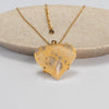 Golden healer faceted heart pendant