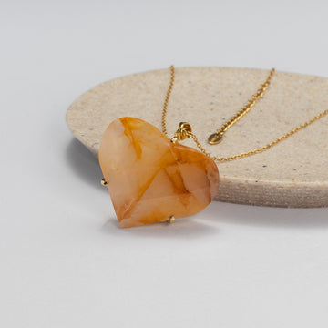 Golden healer faceted heart pendant