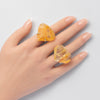 Golden healer faceted heart inner band ring