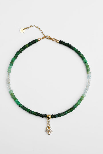 14-karat gold emerald anklet with moissanite hamsa hand charm