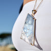 Oversized freeform faceted crystal quartz pendant