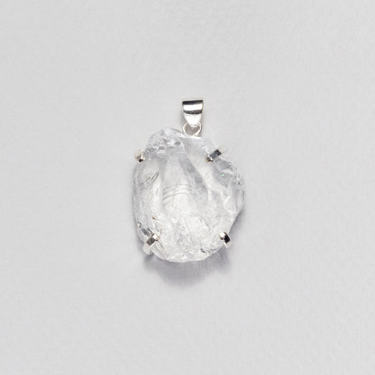 Raw crystal quartz pendant